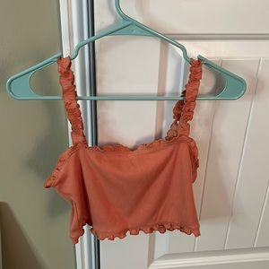 light pink tank top with ruffles